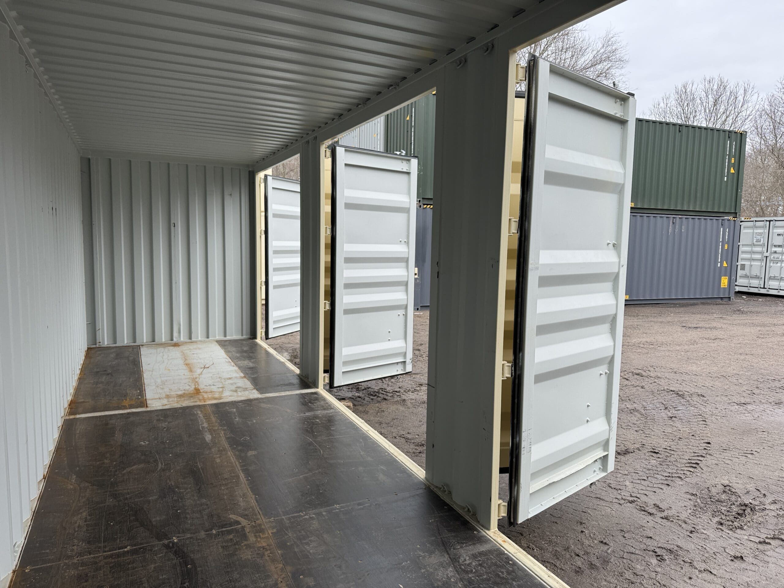 40′ x 8′ x 9.5′ Tall -New *High Cube**FOUR SIDE DOOR OPENINGS** Shipping/Storage Container – Wind and Watertight – BEIGE